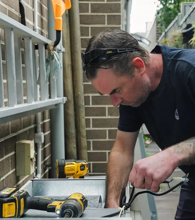 Technician completing property maintenance